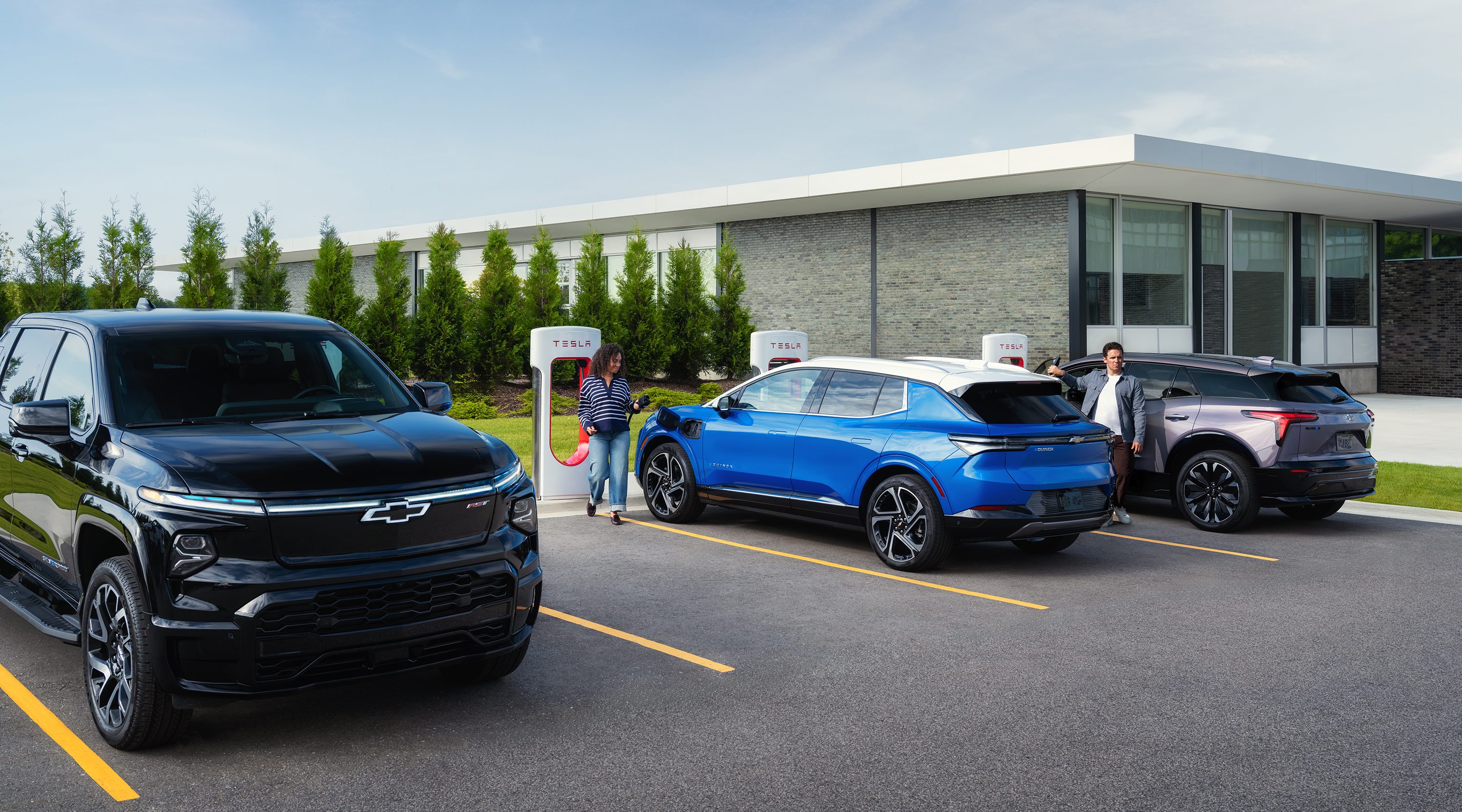 Drivers charging Chevrolet EVs at chargers that utilize the North American Charging Standard