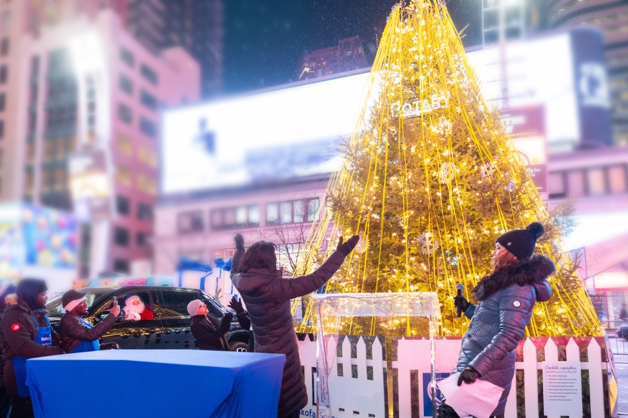 Onlookers celebrate as the 2025 Chevrolet Silverado EV RST with PowerBase