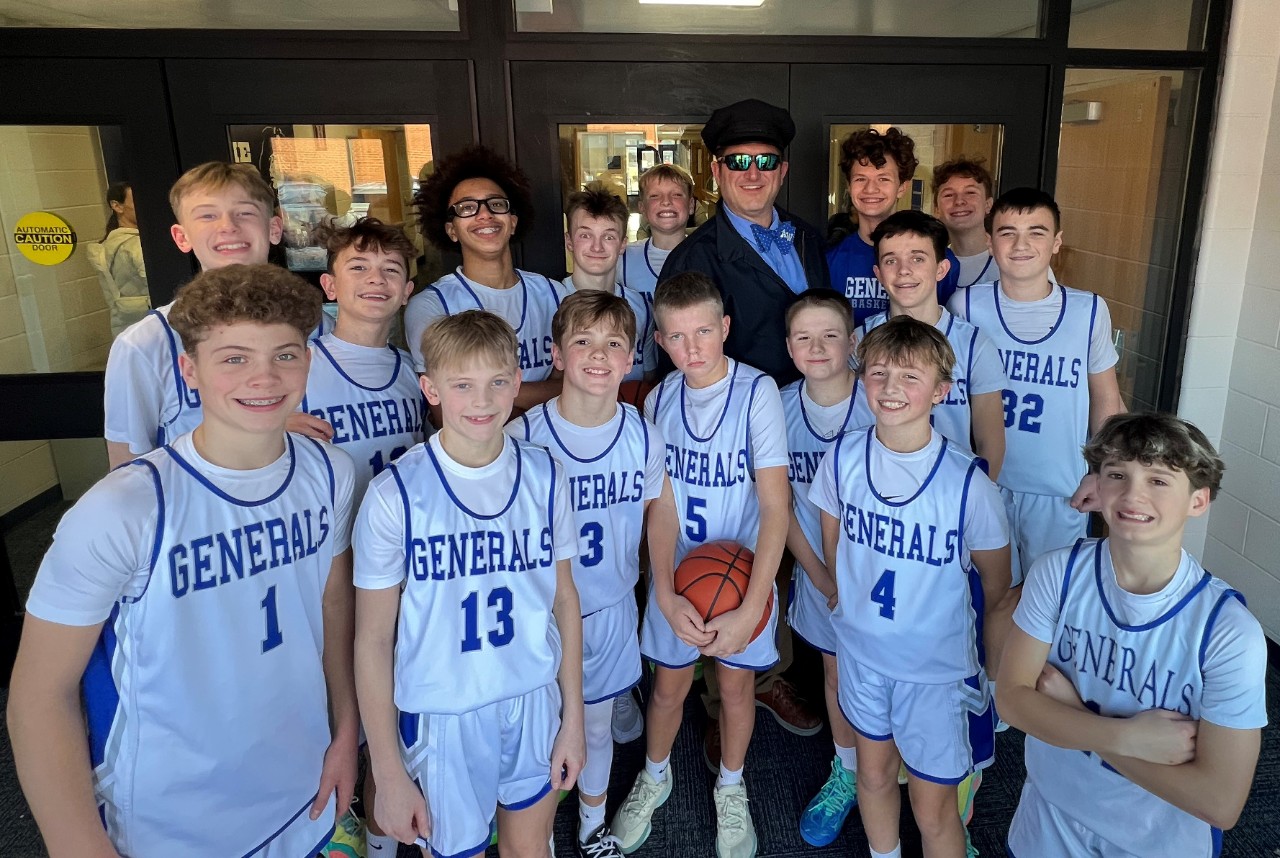 DeWitz Community Work_01 Matt Dewitz with the Anthony Wayne junior high boys’ basketball team.