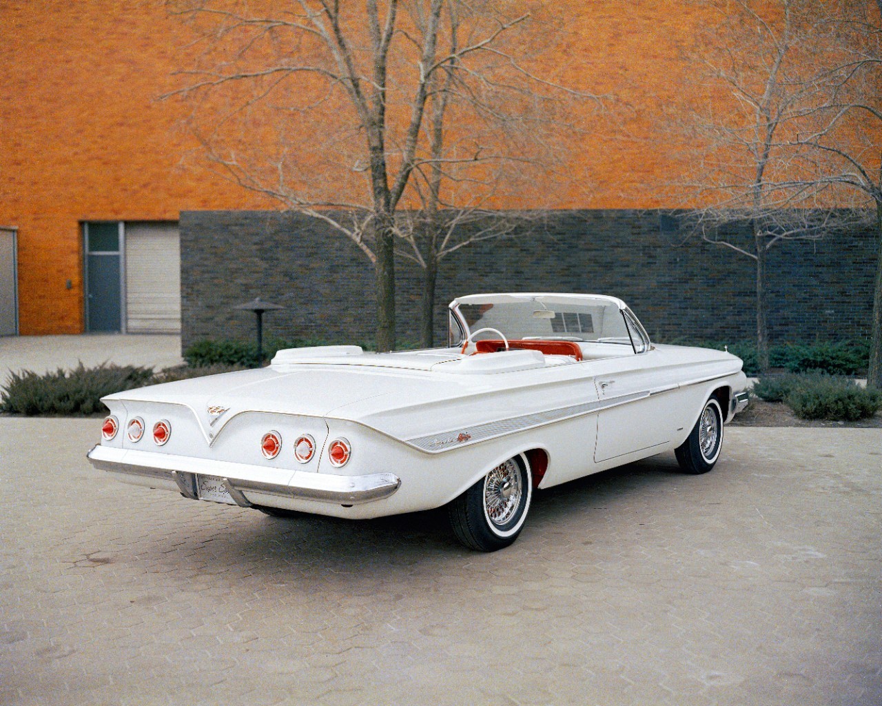 D-C1093 1961 Chevrolet Impala Super Sport Convertible Show Car 03-28-1961 A print advertisement for Chevy’s 1955 police cars.