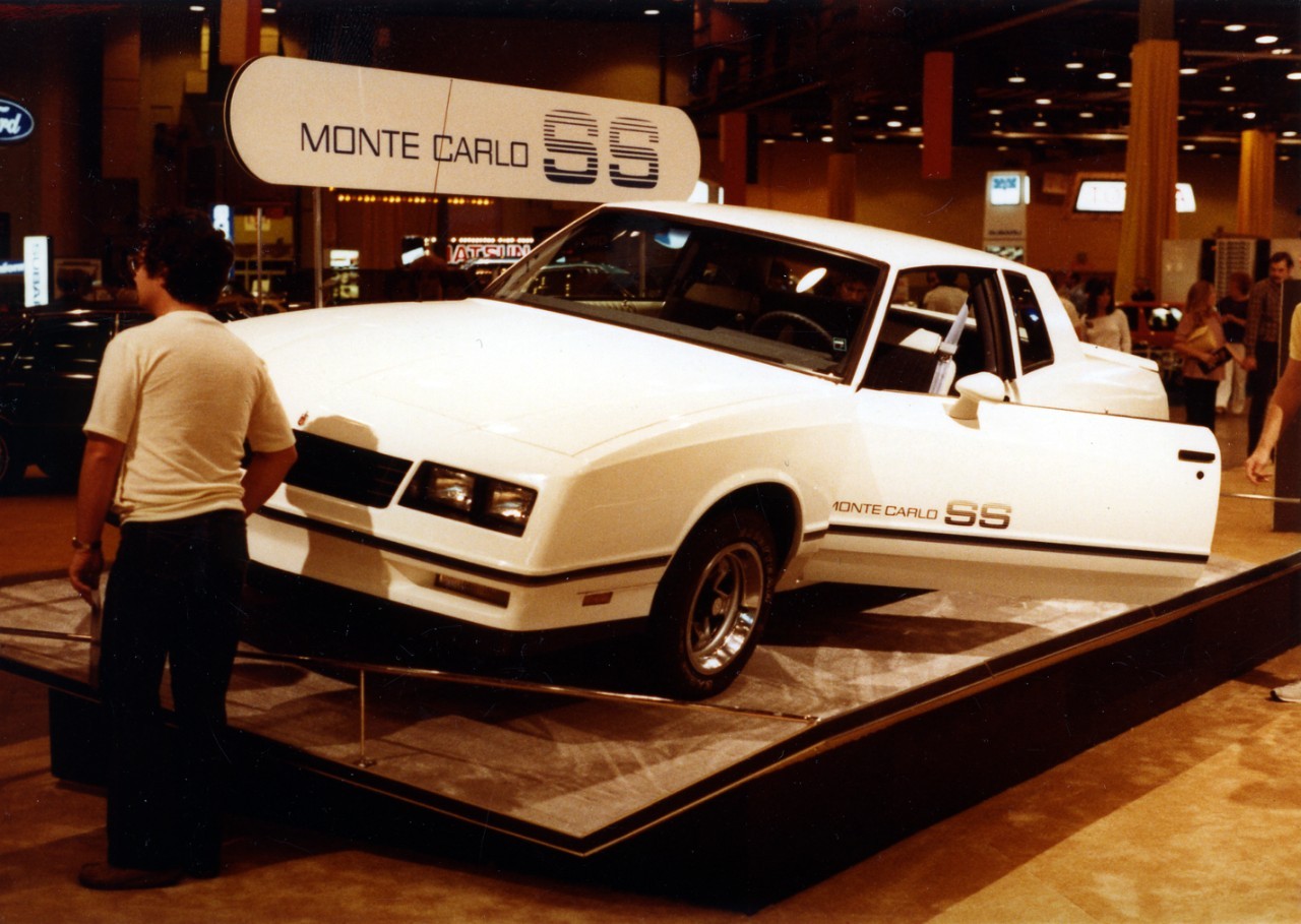 DN584_0521 White 1983 Monte Carlo SS at auto show.