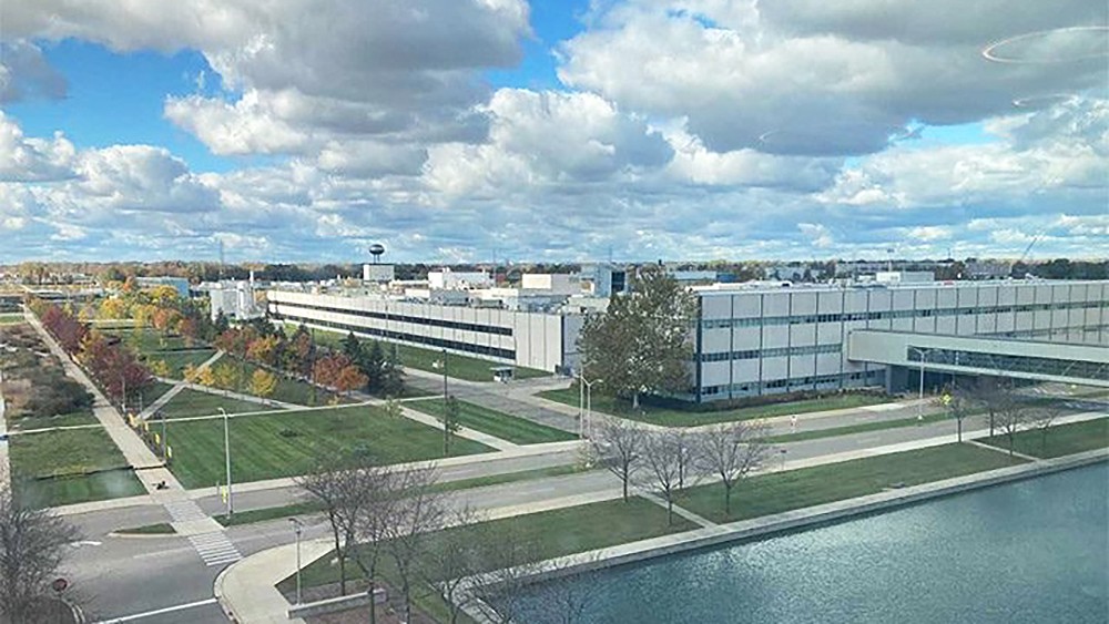 A woman tending plants in a garden