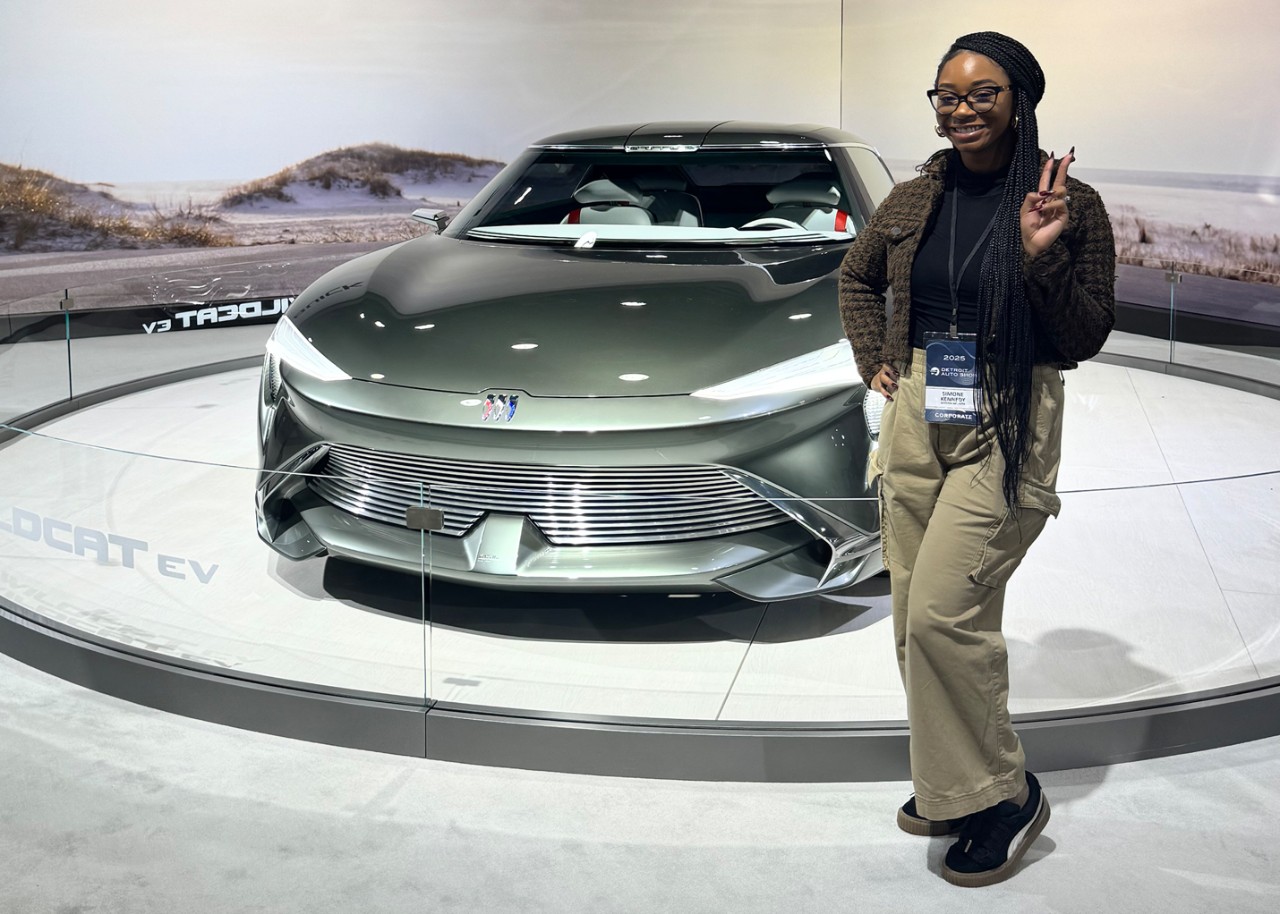 A man standing on the steps of a building.