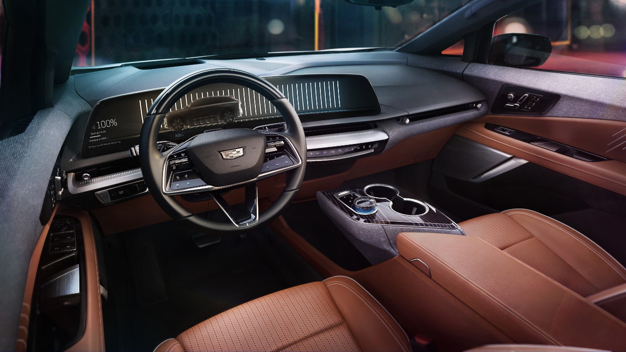 View of the 2025 Cadillac OPTIQ interior featuring the 33-inch-diagonal interface and display with 9K resolution.