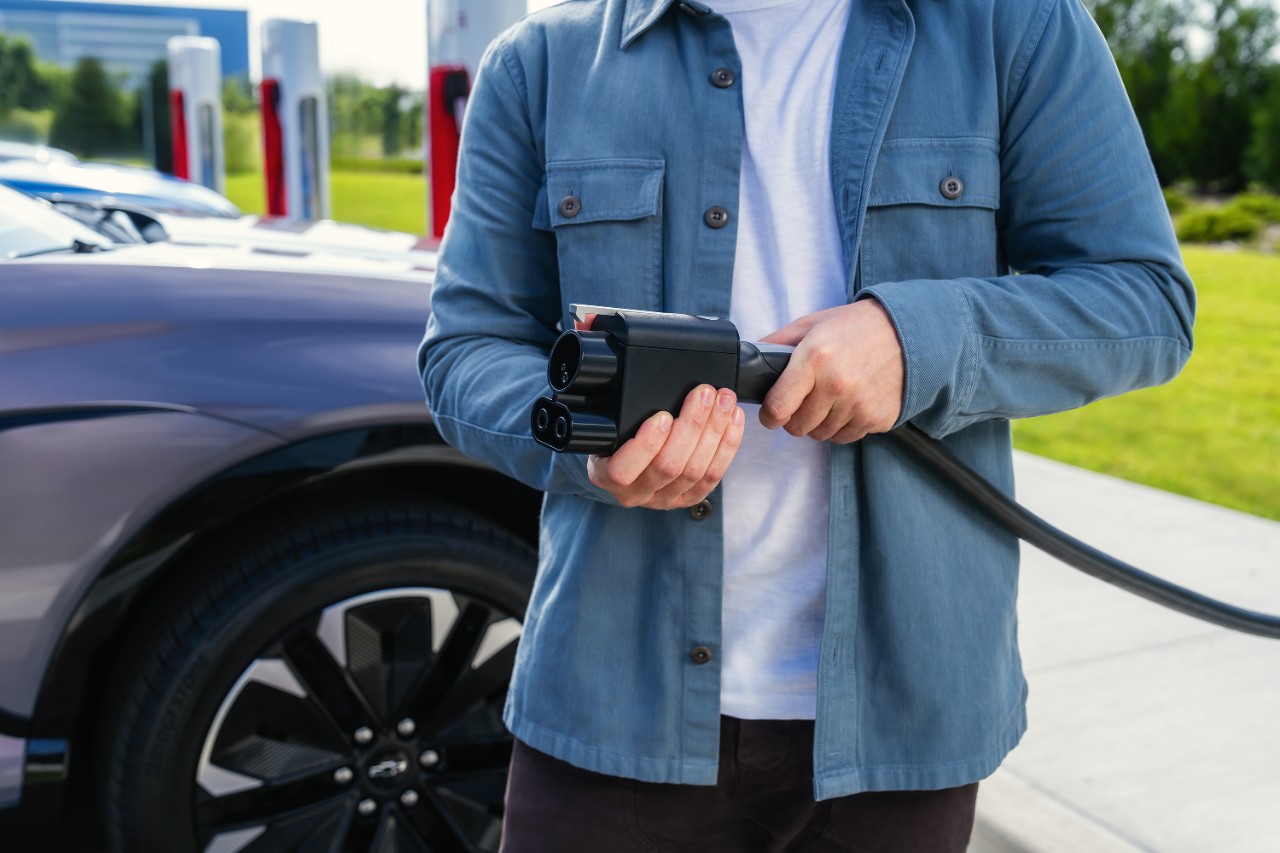 With a NACS adapter, you can charge GM EVs at Tesla Superchargers.