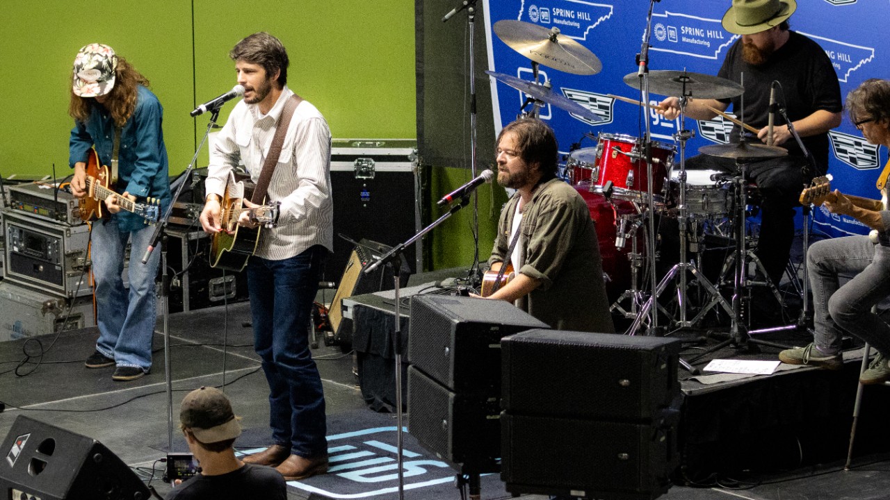 Johnny Dailey and his band perform “Factory Man” at Spring Hill assembly.