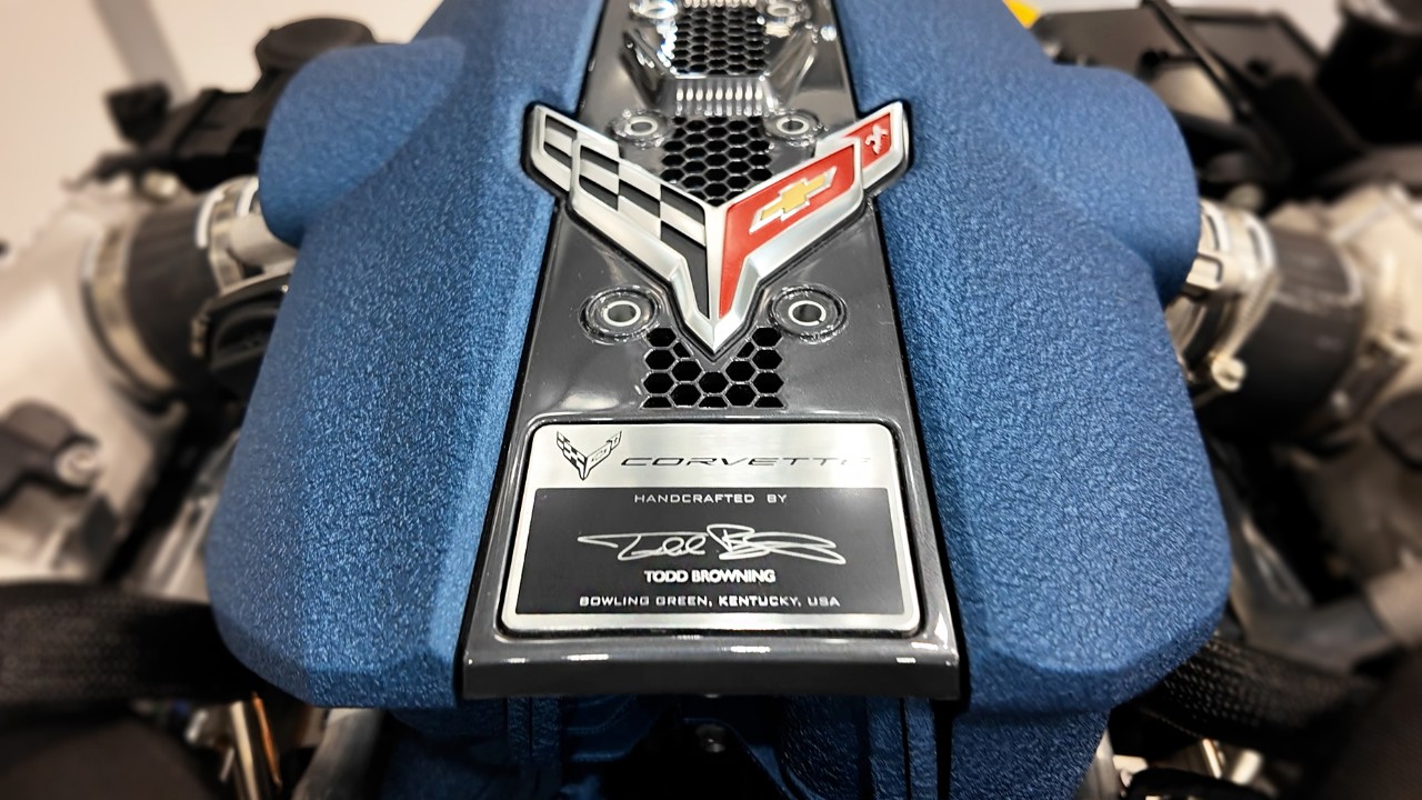 A Corvette engine featuring a technician nameplate.