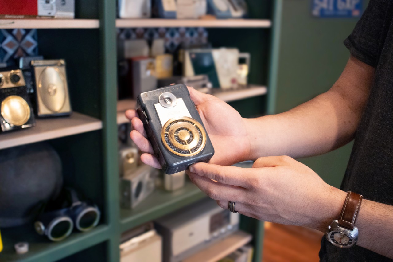 A man building something in a workshop.