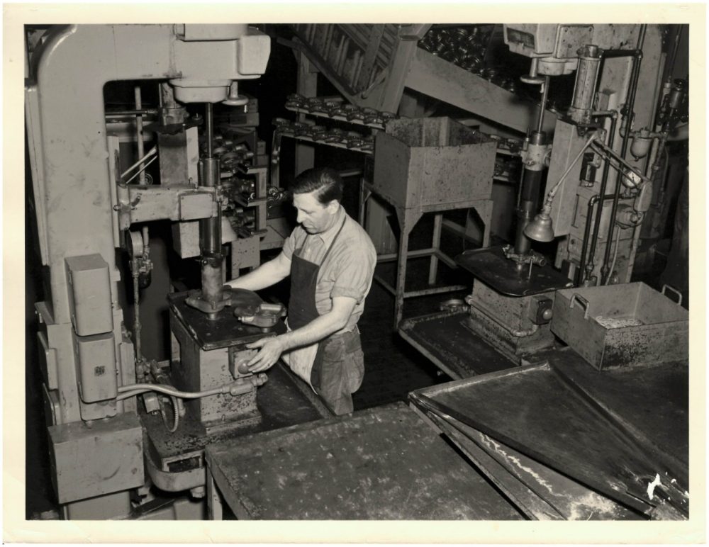 Worker at Tonawanda, formerly the Chevrolet Motor and Axle Plant, assembling motors (circa 1951).