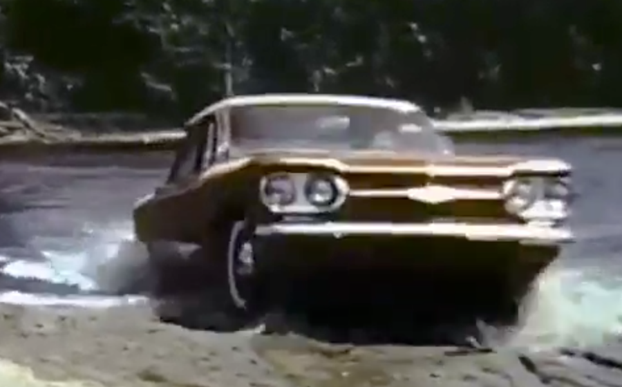 A Corvair crossing a river, from view