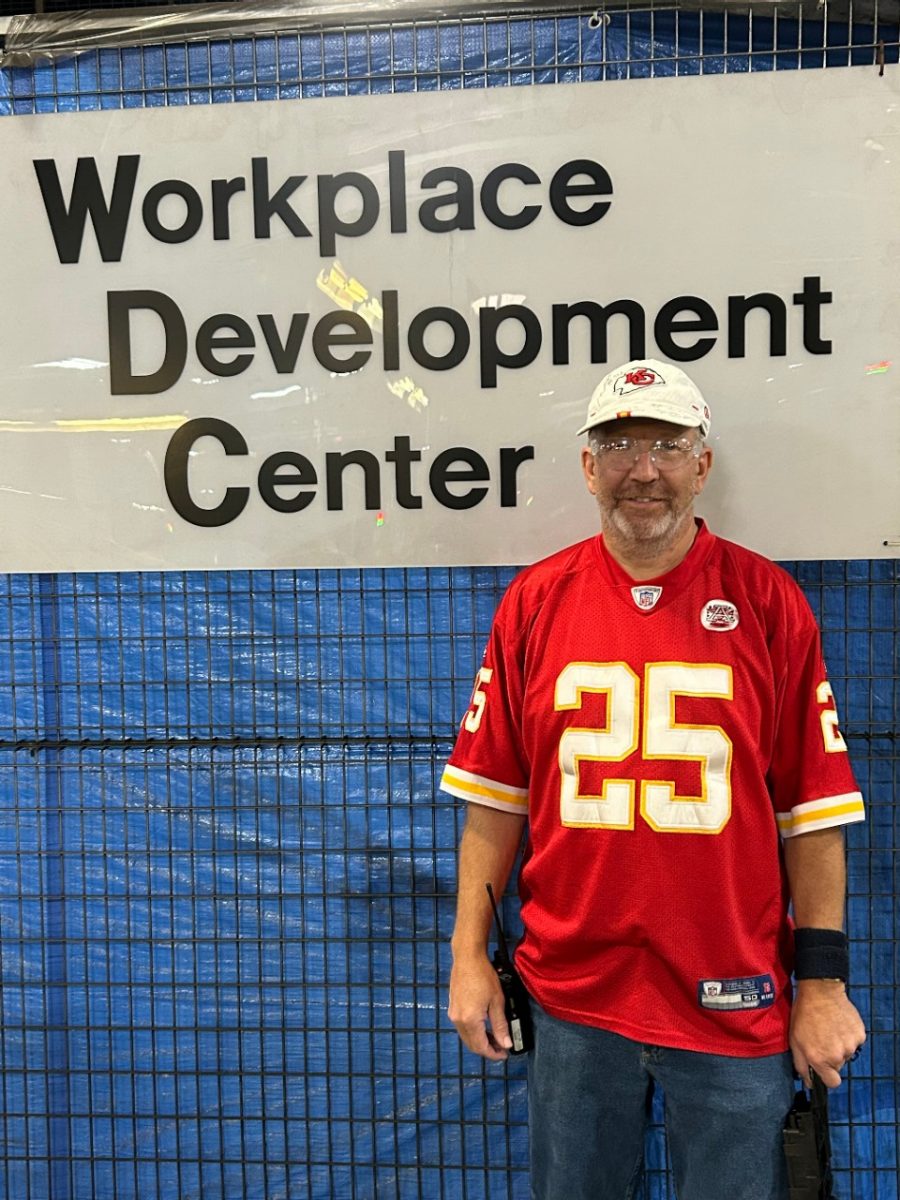 Man standing in auto factory