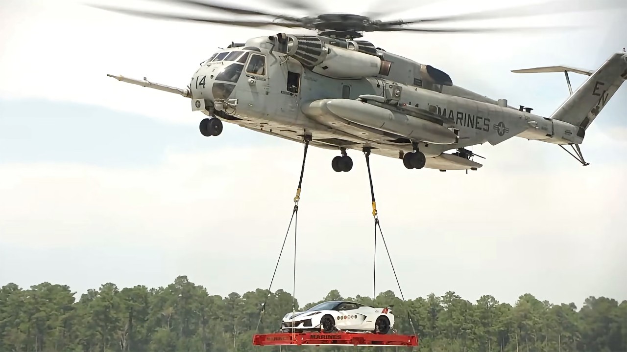 Corvette underneath helicopter