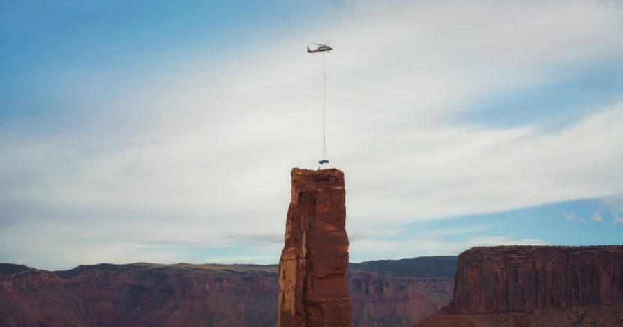 The Chevrolet Silverado ZR2 is being placed on Castleton Tower in Utah by helicopter.