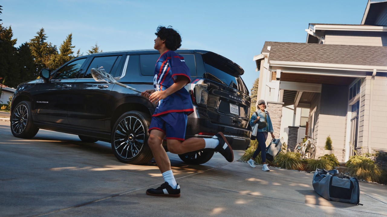Chevrolet Suburban with family
