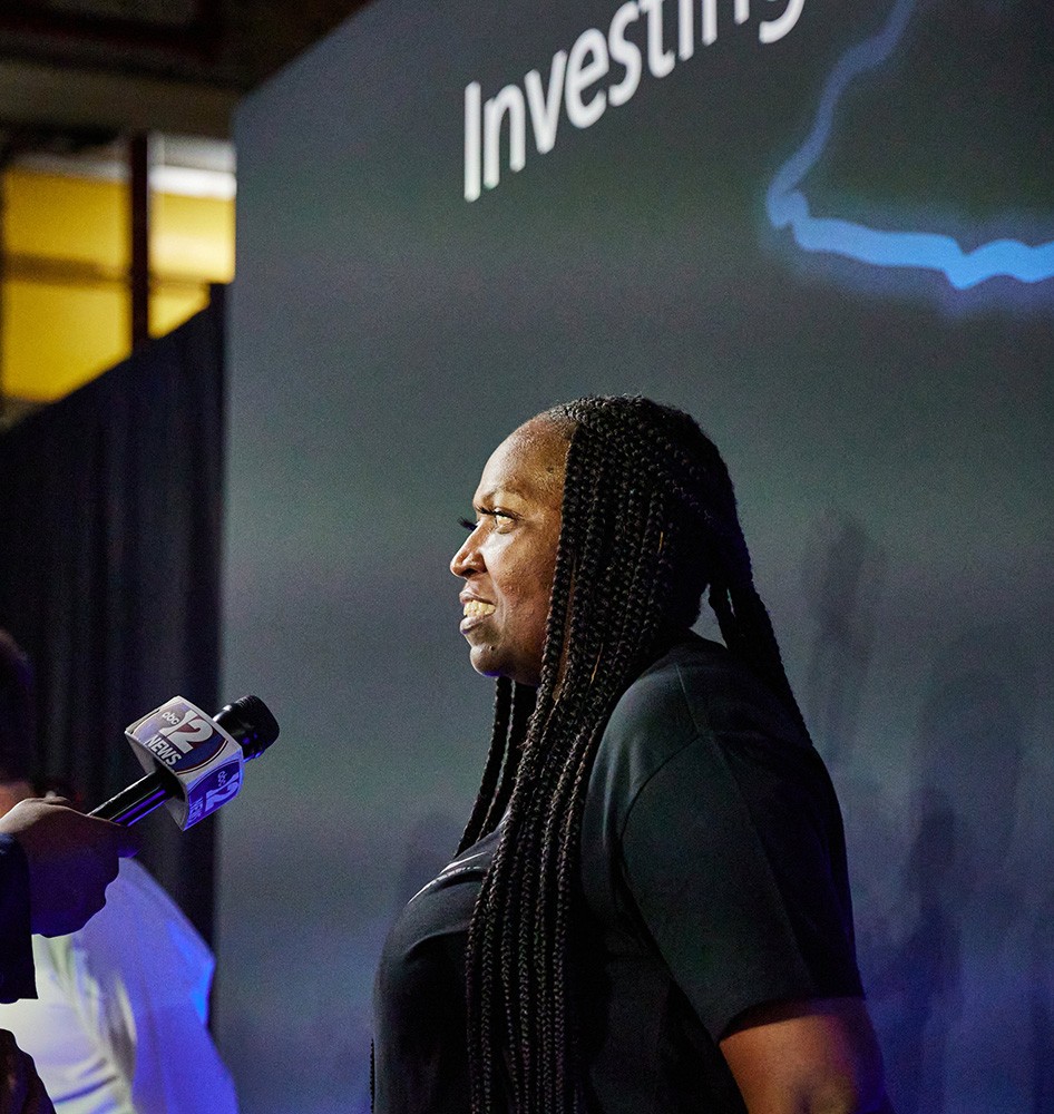 Flint Assembly employee interviewed on reaction to investment news.